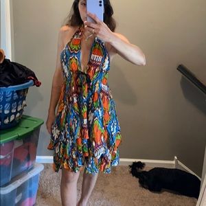 Hot plunging neckline low back halter dress.